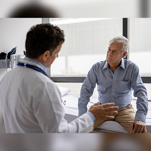 Doctor performing surgery with a team